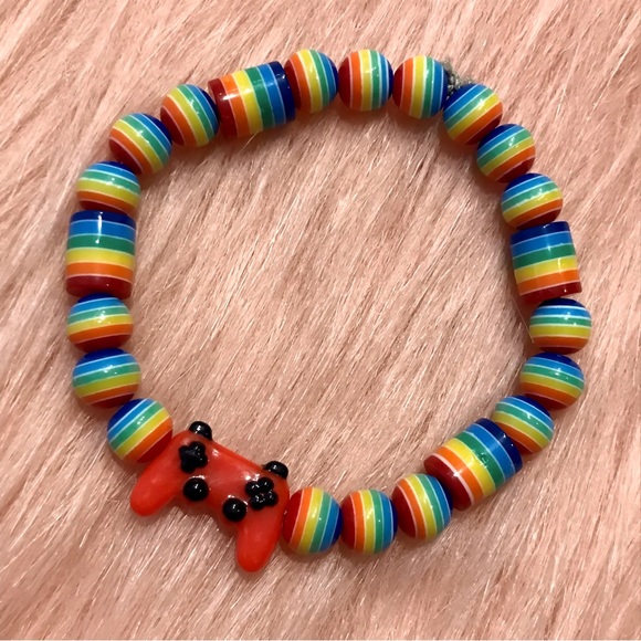 Hand Crafted Jewelry - Handmade Red Video Game Controller Colorful Rainbow Pride Beaded Bracelet